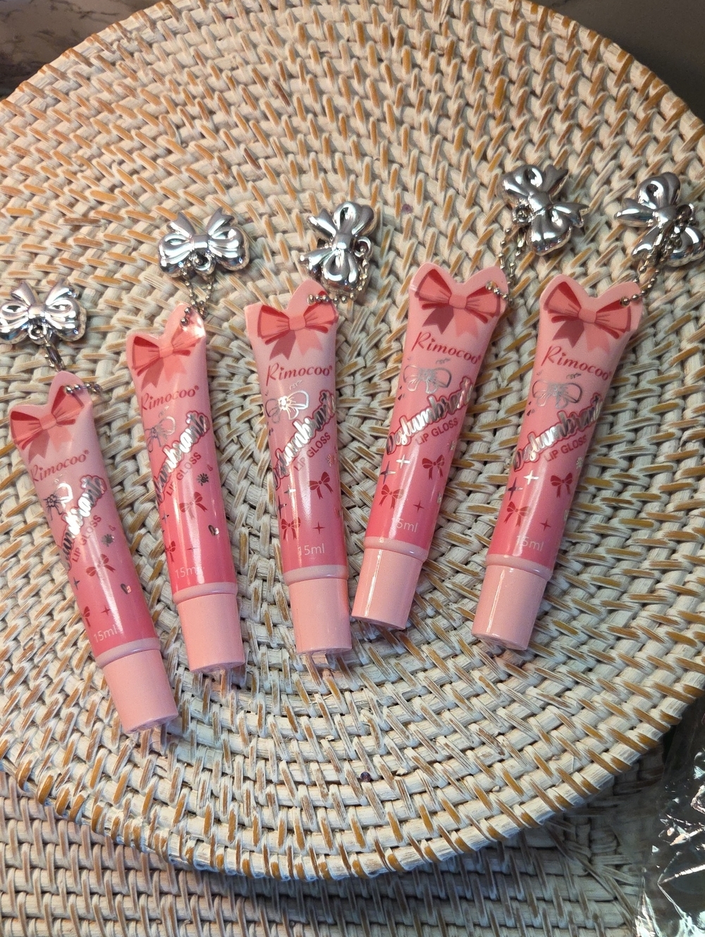 5 For 25 Bow lip glosses with charms